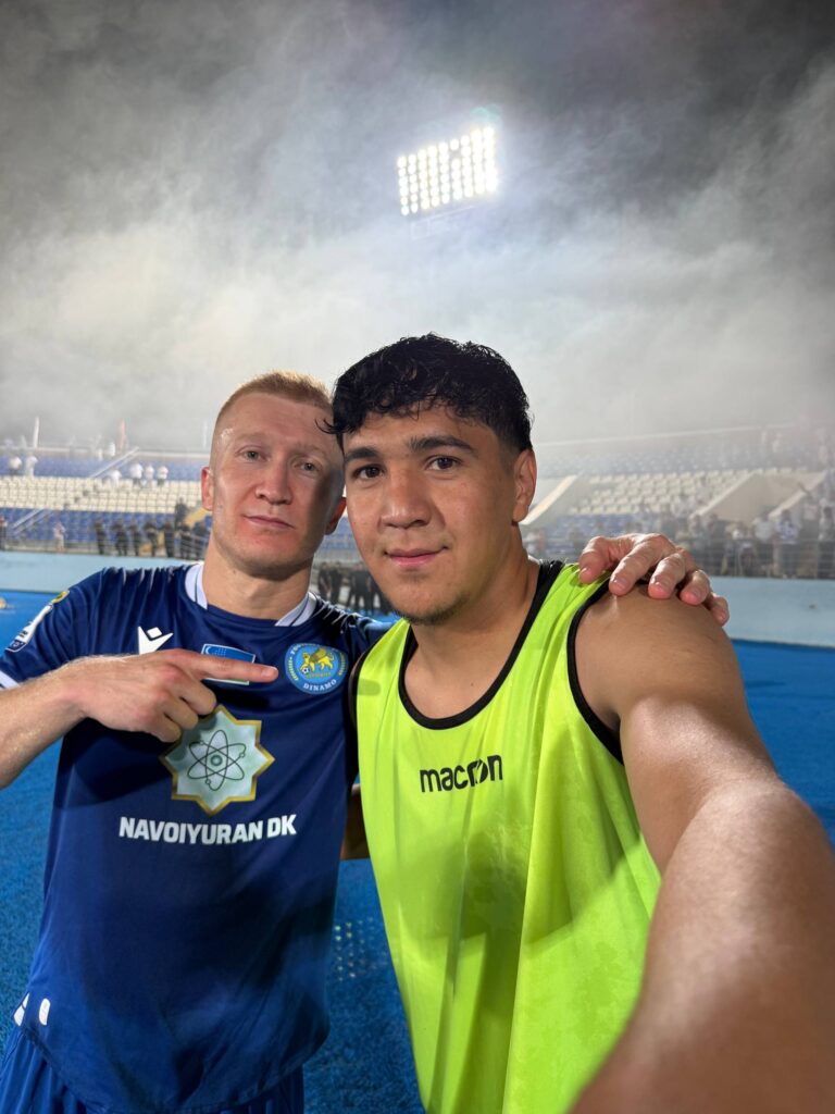 Anvar Khozhimirzaev (left) and Firdavs Abdurakhmonov (right) pose for a selfie after scoring in Dinamo Samarkand's victory over Qizilqum.