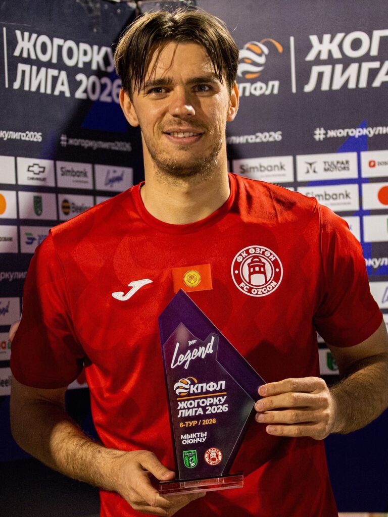 Mikhail Titov poses with his Man of the Match award after scoring in Ozgon's 2-0 away victory over Bishkek City in the 2026 Kyrgyz Jogorku Liga.