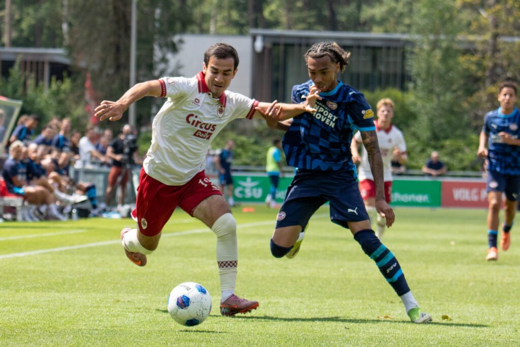 Muhammadali Urinboev dribbles past a PSV defender during Antwerp's pre-season friendly.