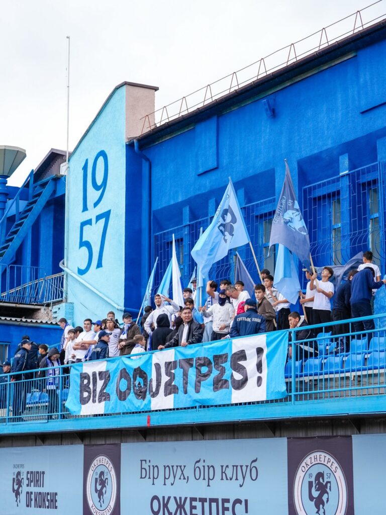 Okzhetpes supporters inside the newly repainted Oqjetpes Stadıony in Kokshetau